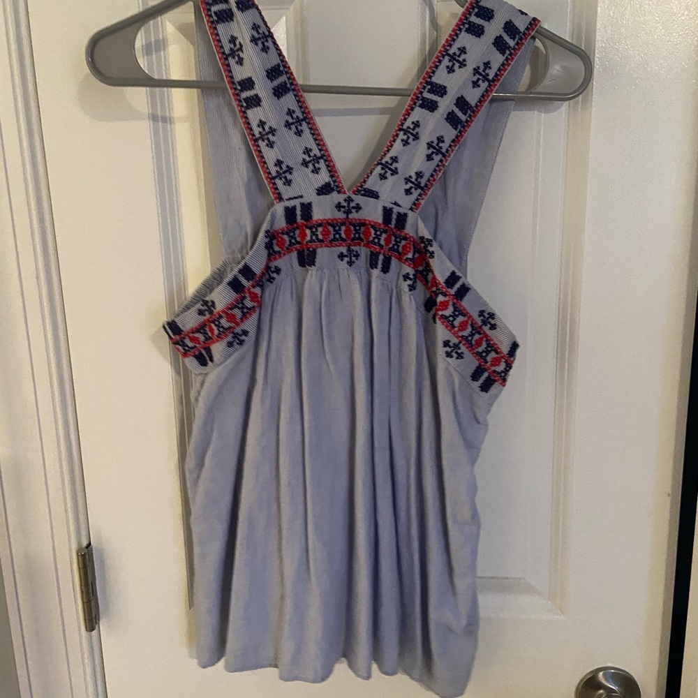 Light blue pattern blouse. Size M